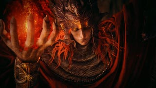 Close up of Messmer, red-haired villain in red cloak holding flame in his hand