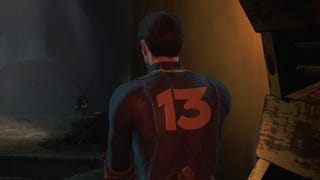 Screenshot from the cancelled Fallout: Vault 13 mod for Fallout 4 showing a Vault Dweller wearing a blue Vault jumpsuit with a yellow '13' on the back.