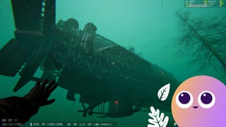 The player inspects a large submarine as it floats in a green-tinted ocean.