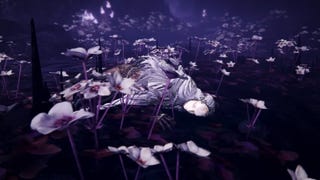 Screenshot from Elden Ring Shadow of the Erdtree trailer showing a figure lying amongst purple flowers