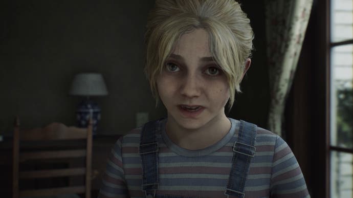 A screenshot from Silent Hill 2 Remake: A young girl with blonde hair  looks directly into the camera, eyes wide.