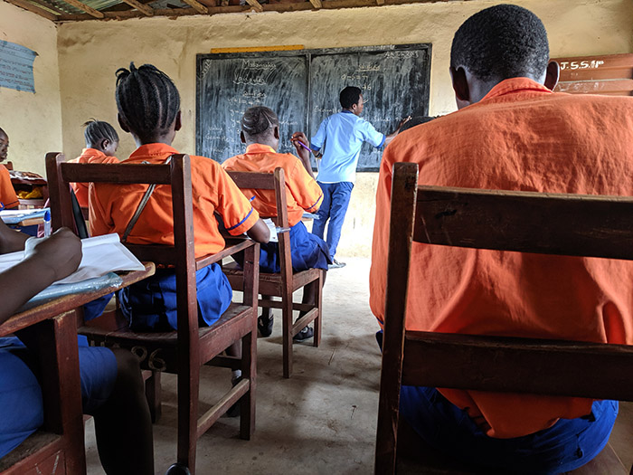 Teacher and students in Sierra Leone classroom