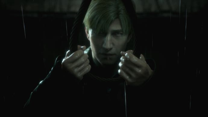 James holding a noose with both hands in the rain in Silent Hill 2.