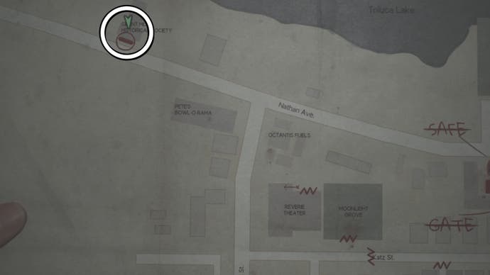 A white circle showing where the Obsidian Goblet is on the map in Silent Hill 2.