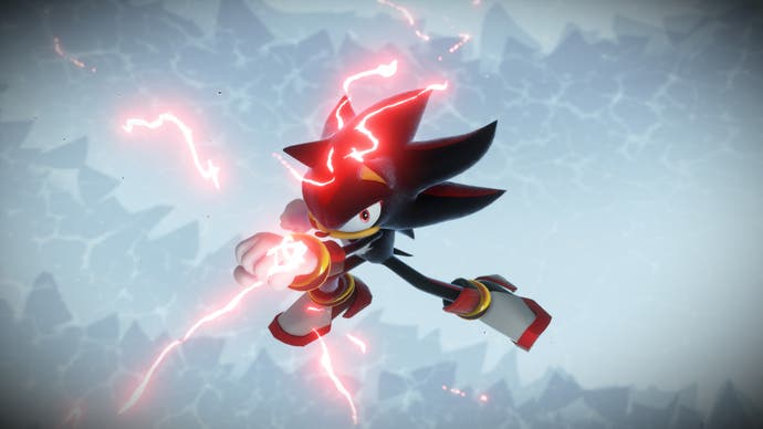 Shadow the black hedgehog hovers in the air gathering red electrical energy