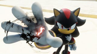 Shadow the black hedgehog holds out his hand with black and red energy