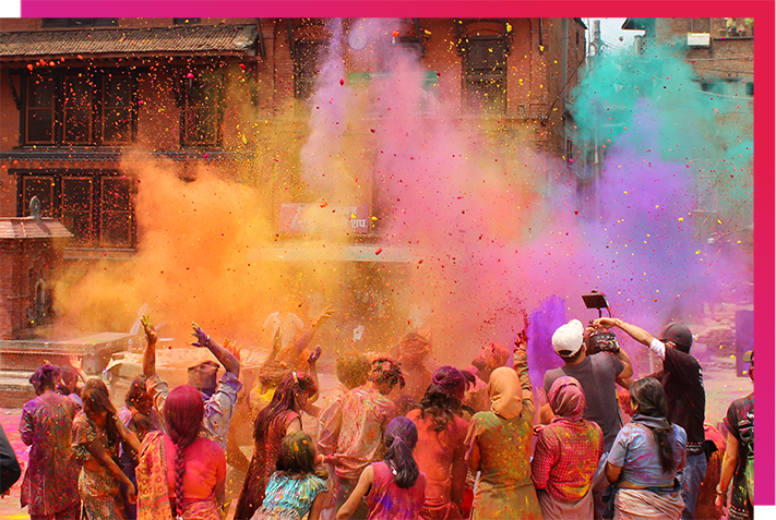 Holi festival group of people throwing colors springtime traditions around the world for world language classroom activity