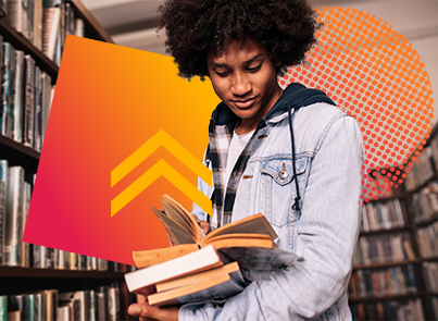 Secondary student in school library reading a book.